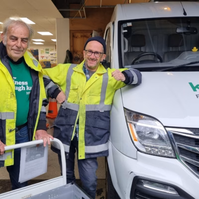 Kaibosh Food Rescue Drivers standing next to Kaibosh van at the Kaibosh Wellington depot.